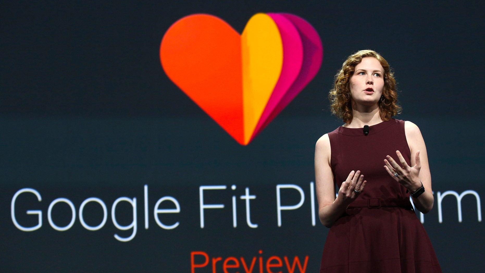 Ellie Powers, Product Manager for Google Play, announces the new Google Fit development platform during the Google I/O developers conference June 25, 2014.