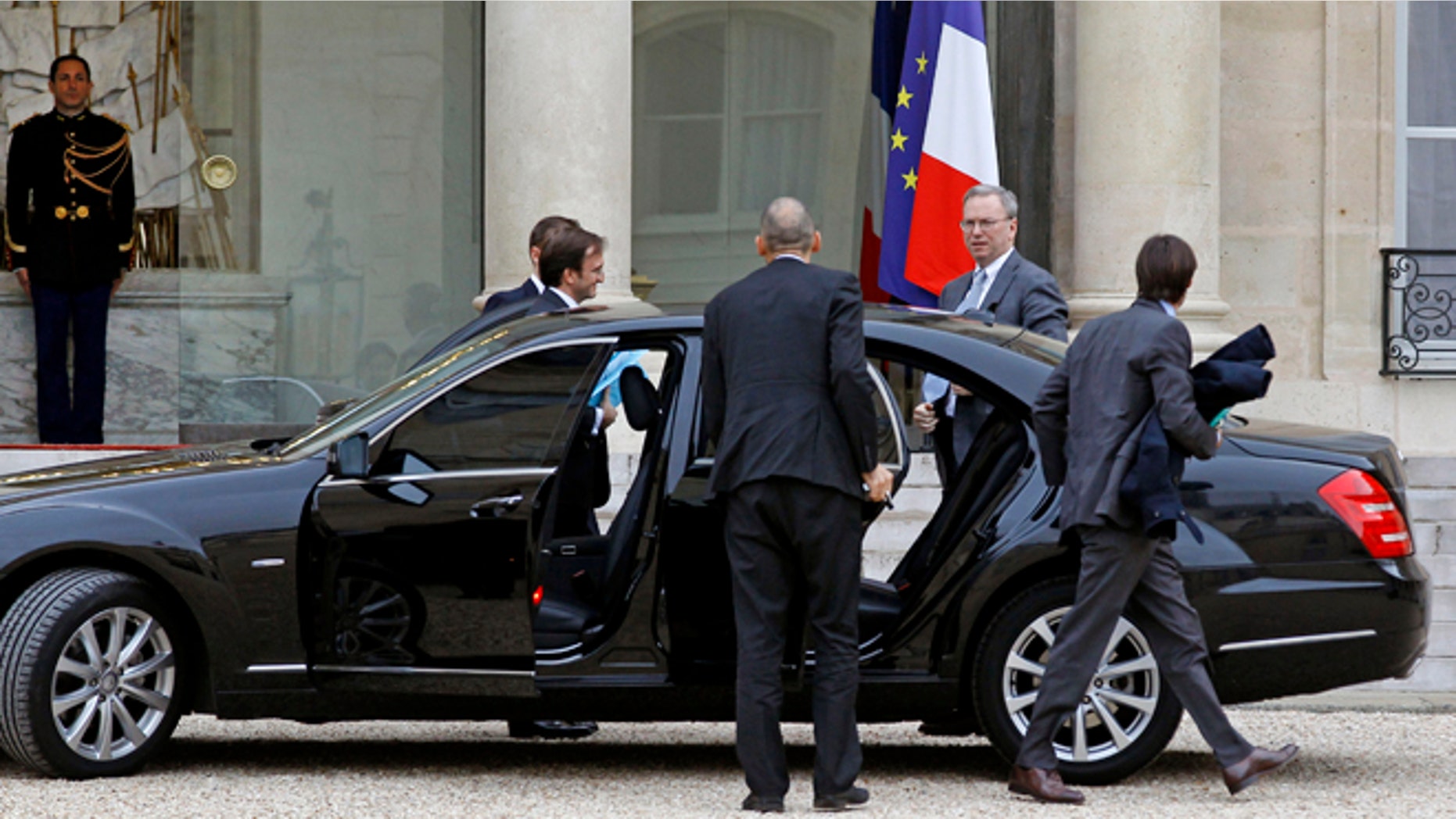 Oct. 29, 2012: Google executive chairman Eric Schmidt, second from right, arrives at the Elysee Palace for a meeting with French President Francois Hollande, in Paris.