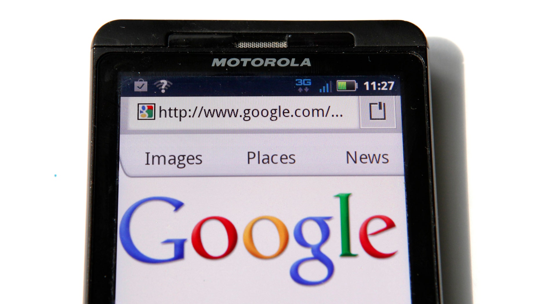 A Google homepage is displayed on a Motorola Droid phone in Washington August 15, 2011. Google Inc will buy phone hardware maker Motorola Mobility Holdings Inc for $12.5 billion to bolster adoption of its Android mobile software, and compete with smartphone rival Apple Inc. In its biggest deal to date, Google said it would pay $40 per share in cash, a 63 percent premium to Motorola Mobility's Friday closing price on the New York Stock Exchange.
REUTERS/Kevin Lamarque (UNITED STATES - Tags: SCI TECH BUSINESS) - RTR2PYXI