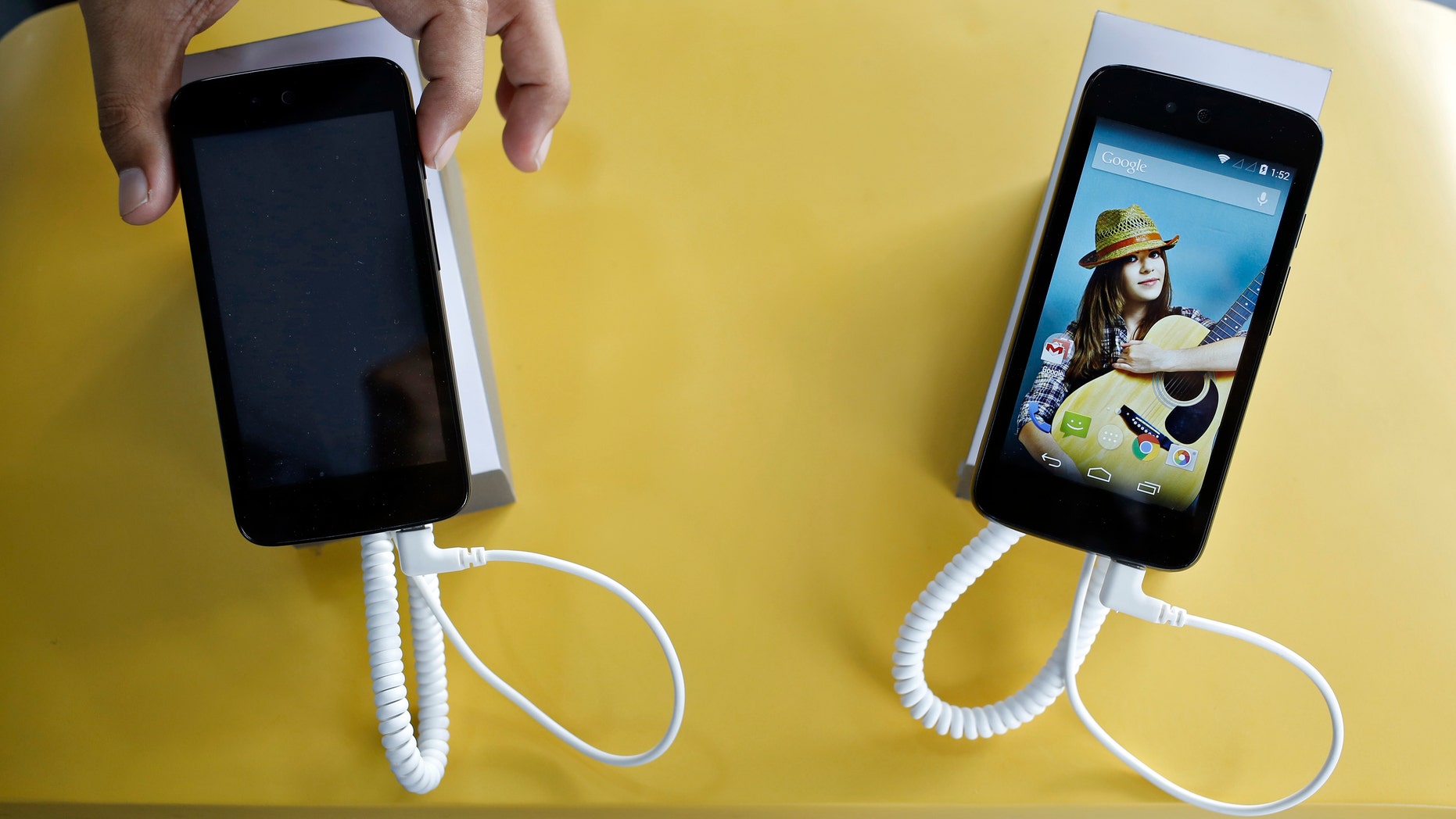 Android One based mobiles are on display during its launch in New Delhi September 15.
