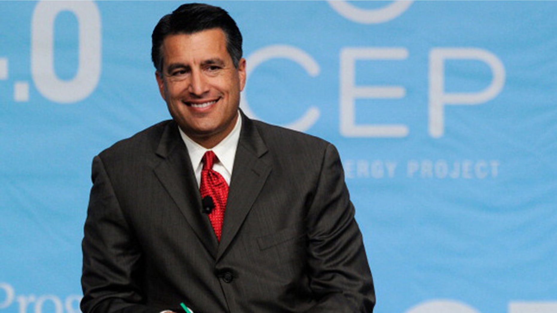 LAS VEGAS, NV - AUGUST 30: Nevada Gov. Brian Sandoval smiles during the National Clean Energy Summit 4.0 at the Aria Resort & Casino at CityCenter August 30, 2011 in Las Vegas, Nevada. Political and economic leaders are attending the summit to discuss a domestic policy agenda to advance alternative energy for the country's future. (Photo by Ethan Miller/Getty Images)