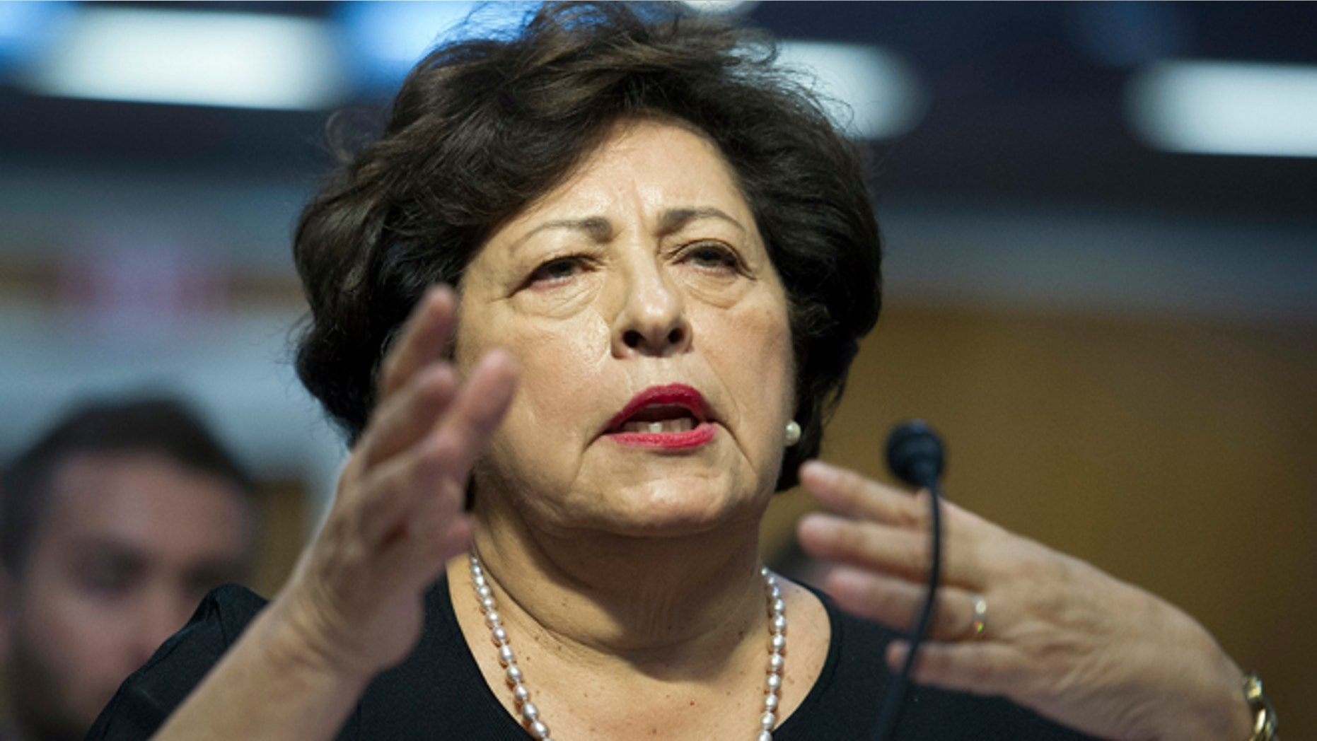 Katherine Archuleta, director, Office of Personnel Management, gestures while she testifies before the Senate Appropriations subcommittee on Financial Services and General Government hearings to review IT spending and date security at the Office of Personnel Management in Washington, Tuesday, June 23, 2015. (AP Photo/Cliff Owen)