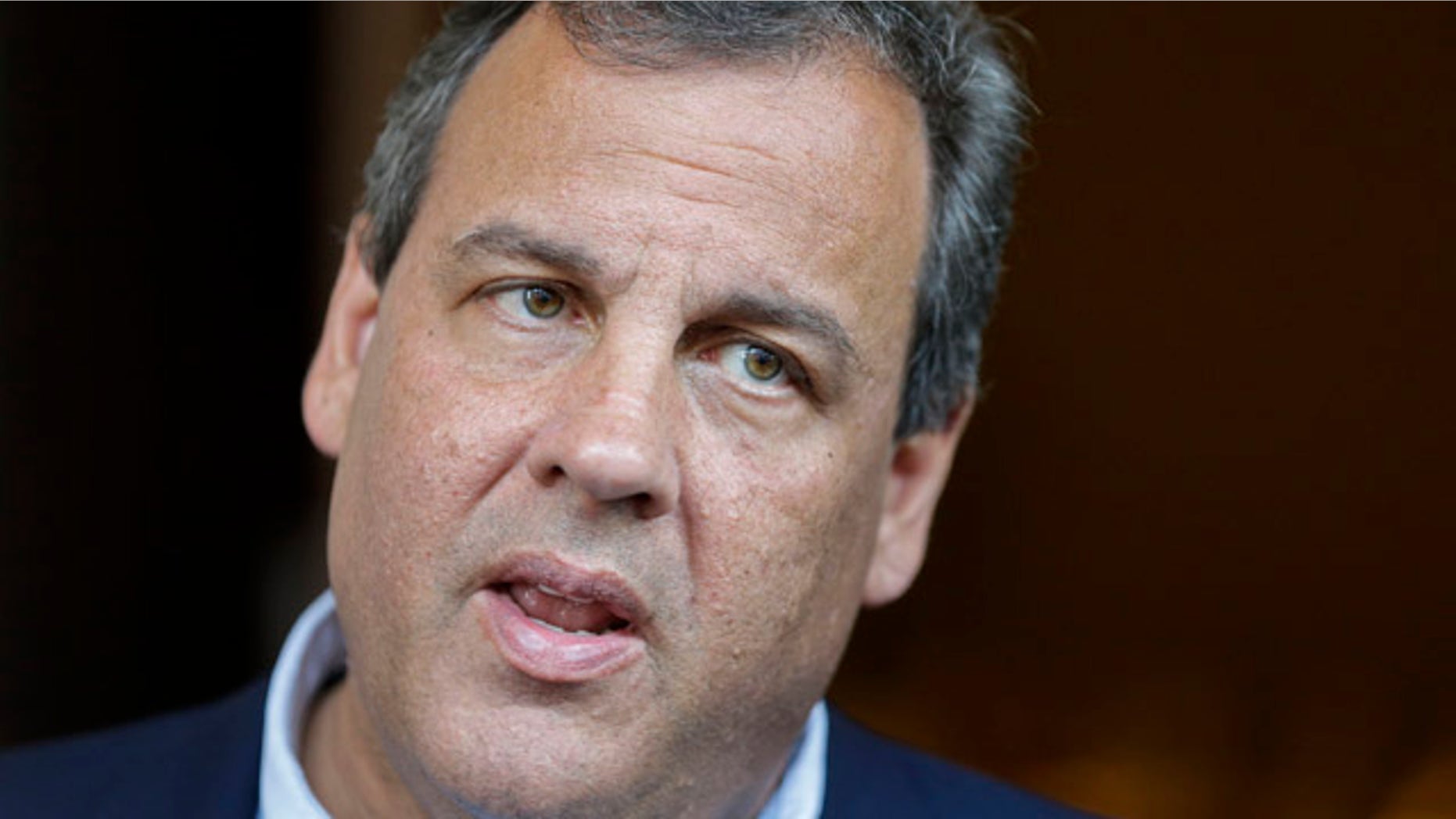 July 12, 2014: New Jersey Gov. Chris Christie talks with the media at the National Governors Association convention in Nashville, Tenn. (AP Photo/Mark Humphrey)