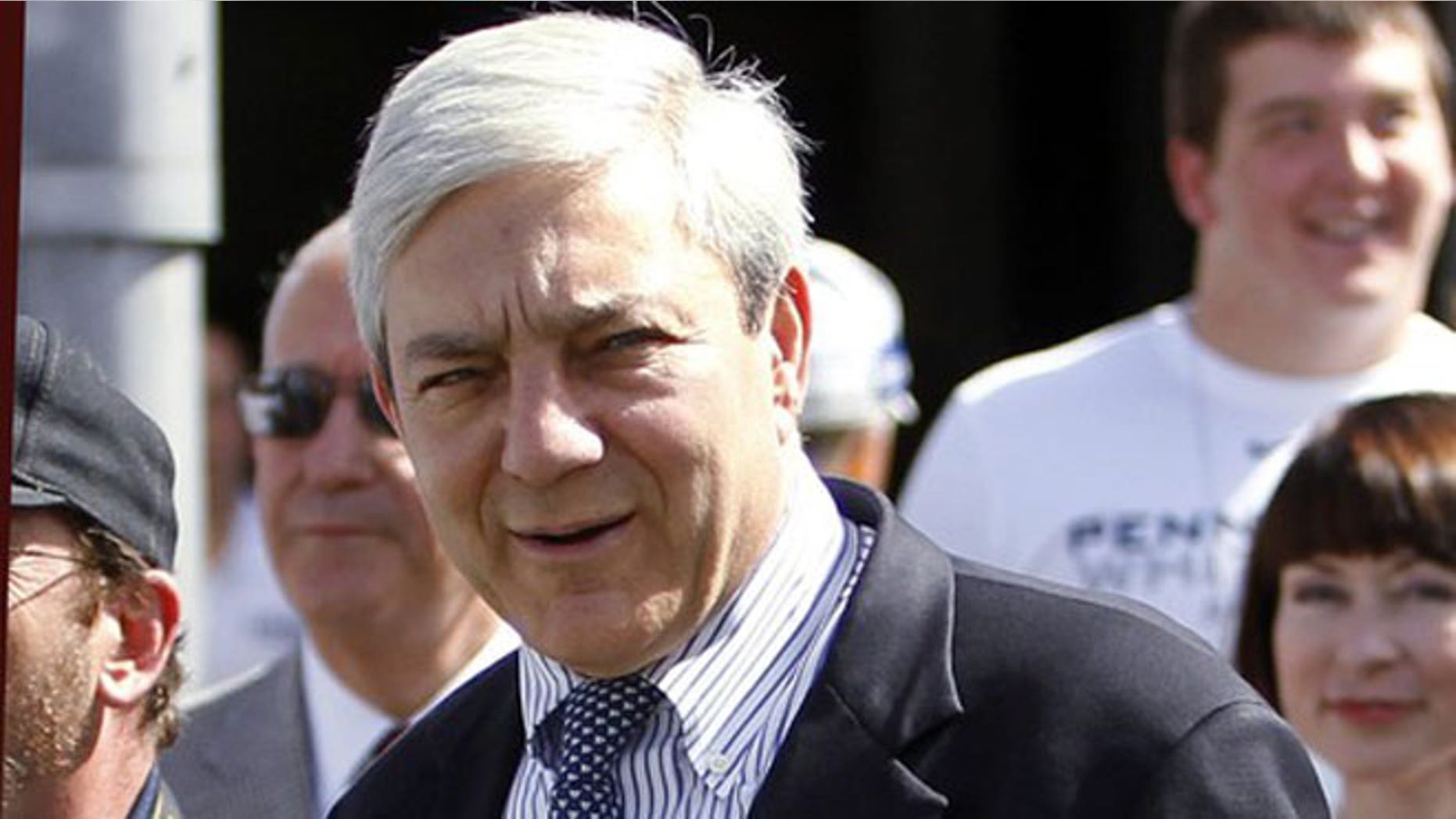 September 10, 2011: Former Penn State president Graham Spanier walks to the field before the Alabama versus Penn State football game at Beaver stadium in State College, Pennsylvania.
