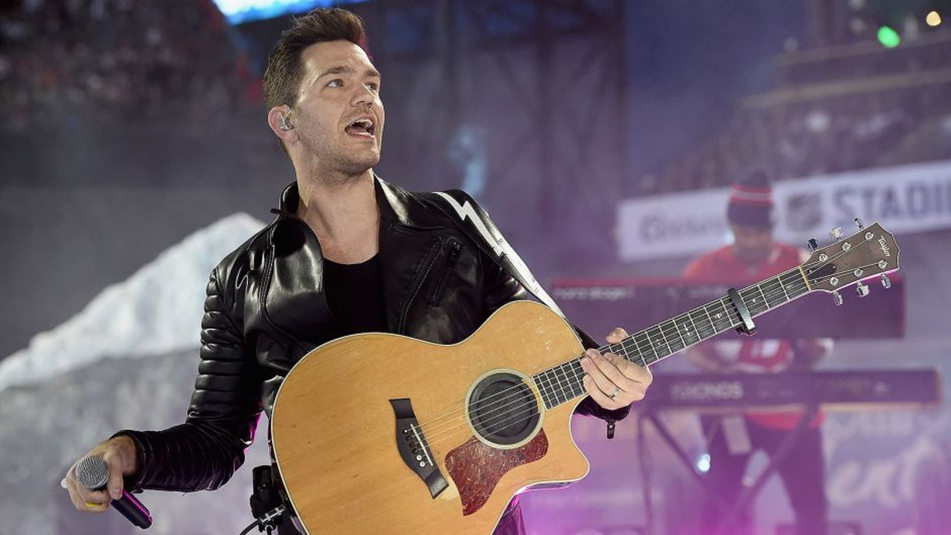 DENVER, CO - FEBRUARY 27: Recording artist Andy Grammer performs during pregame of the 2016 Coors Light Stadium Series game between the Detroit Red Wings and the Colorado Avalanche at Coors Field on February 27, 2016 in Denver, Colorado. (Photo by Brian Babineau/NHLI via Getty Images)