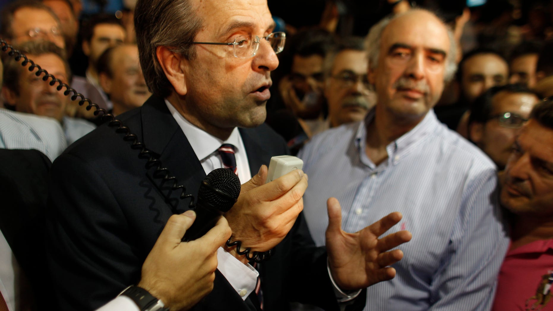 June 17, 2012: Leader of the New Democracy conservative party Antonis Samaras, speaks to supporters at an election stand at Syntagma square in Athens.