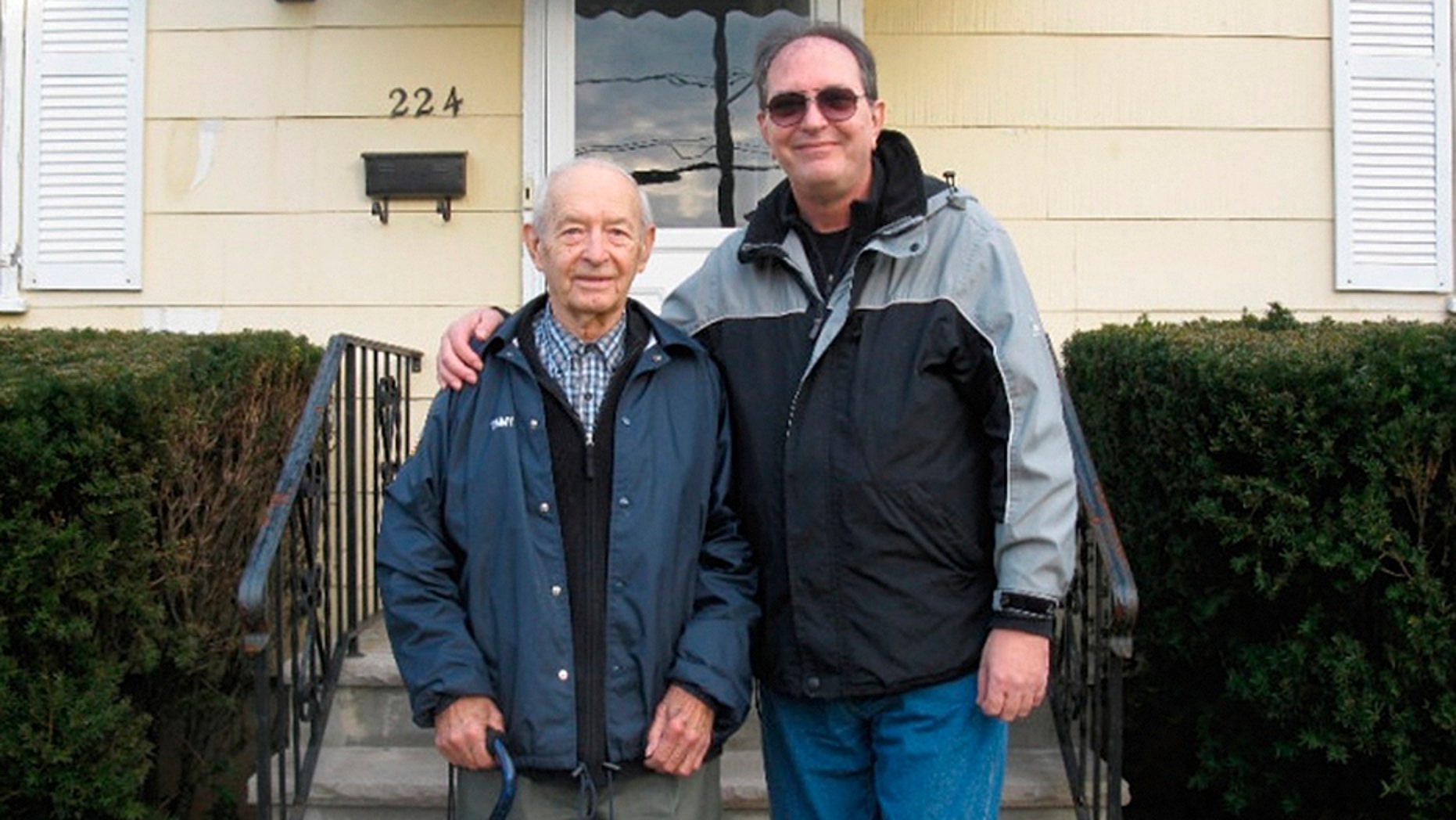 Greg Woienski (right) was headed off to his father's funeral when the incident allegedly occurred.