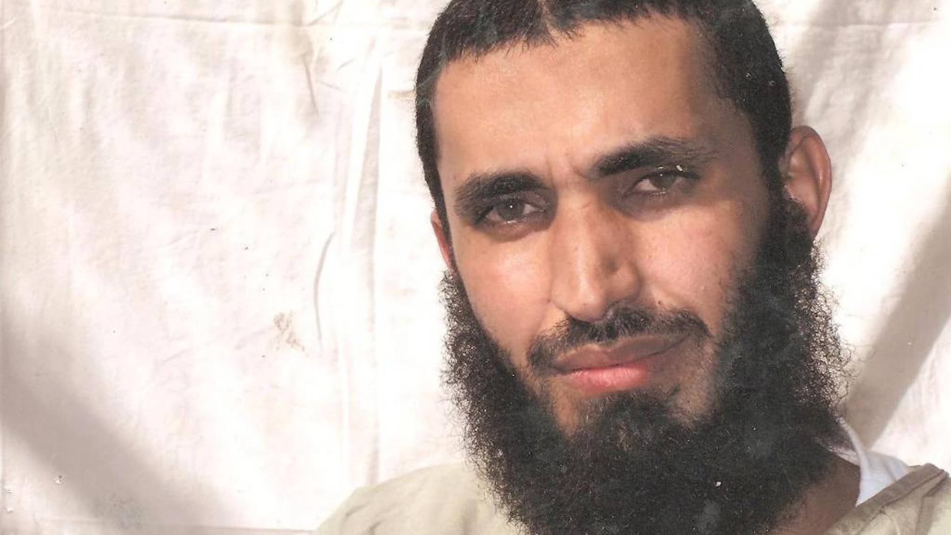This undated photo taken by the International Red Cross released by attorney David Remes shows Remes' client Abdalmalik Wahab taken as he is held at the detention center on the U.S. Navy base at Guantanamo Bay, Cuba. A panel made up of representatives of six government agencies, including the Defense Department and the Office of the Director of National Intelligence, determined on Dec. 5 that Abdalmalik was “almost certainly” a member of al-Qaida at one point but it was no longer worth keeping him at the U.S. base in Cuba. T thirty-five-year-old had been imprisoned at Guantanamo Bay for nearly 14 years without charge. (AP Photo/Courtesy of David Remes)