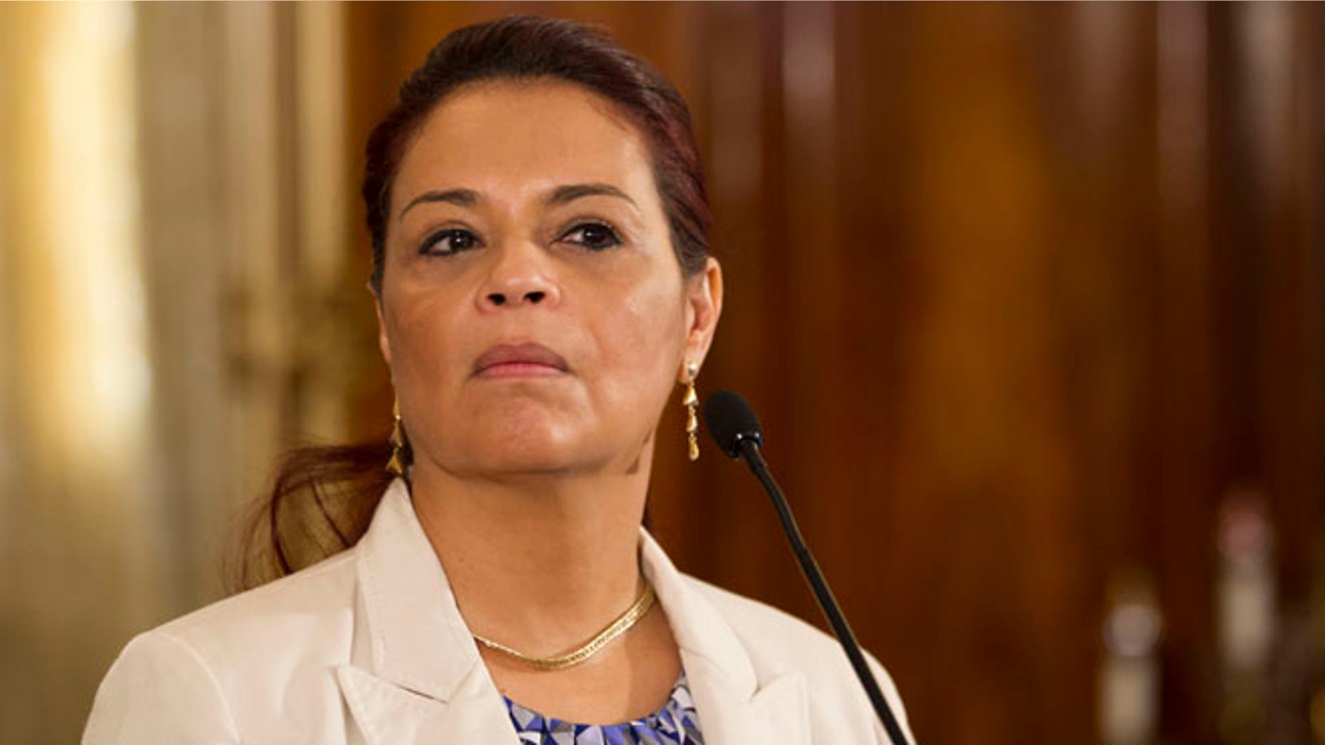 FILE - In this April 19, 2015 file photo, Guatemala's Vice President Roxana Baldetti listens to a question from journalists during a press conference at the presidential house in Guatemala City. President Otto Perez Molina announced Friday, May 8, 2015, that Baldetti will leave office. She is resigning amid a customs corruption scandal that has implicated her former private secretary. (AP Photo/Moises Castillo, File)