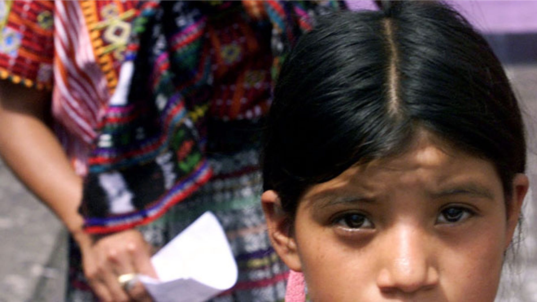 402071 02: Women march during a demonstration to commemorate International Womens Day March 8, 2002 in Guatemala City. Women in this traditional Central American nation, where "macho" attitudes prevail, complain of suffering extreme discrimination and abuse both in the workplace and at home, with women from the countrys historically oppressed Maya Indian ethnic groups suffering what they refer to as "double" discrimination. (Photo By Andrea Nieto/Getty Images)