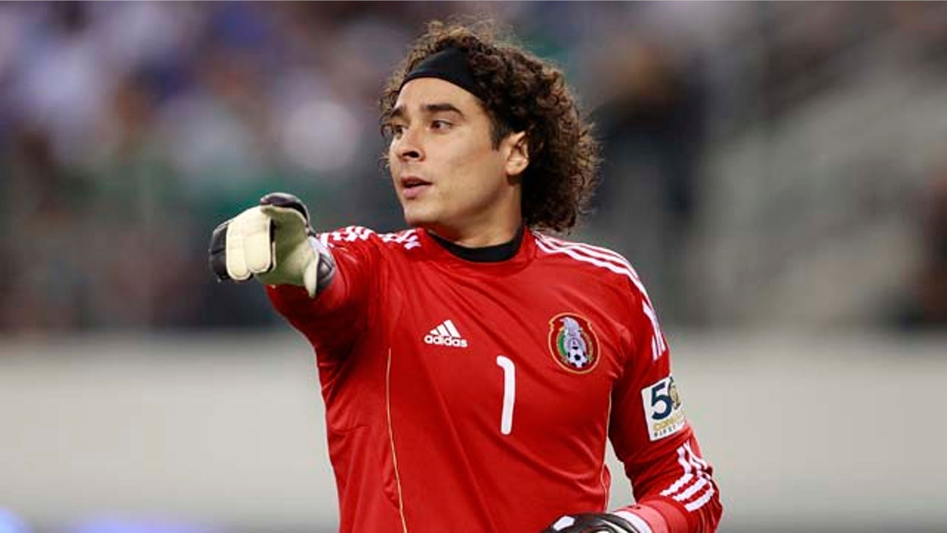 ARLINGTON, TX - JUNE 05: Guillermo Ochoa #1 of Mexico gestures to the referee during the match against El Salvador at the CONCACAF Gold Cup qualifying match at Cowboys Stadium on June 5, 2011 in Arlington, Texas. (Photo by Rick Yeatts/Getty Images)