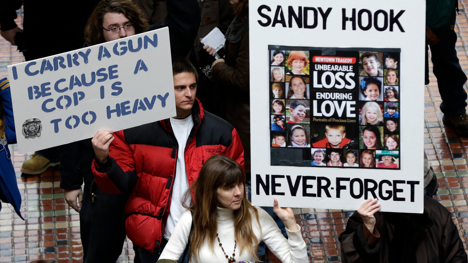 Jan. 23, 2013: Gun rights and gun control advocates demonstrate in the Pennsylvania Capital building in Harrisburg, Pa.