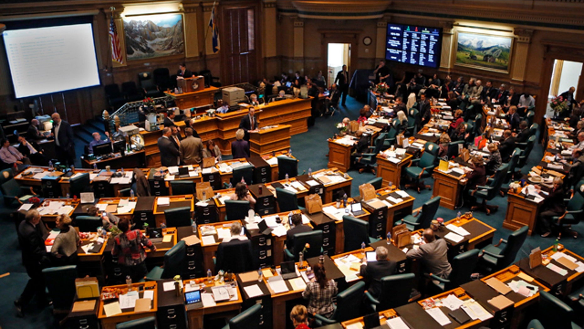 Feb. 15, 2013: Colorado House members gather in their Chamber at the Capitol in Denver.
