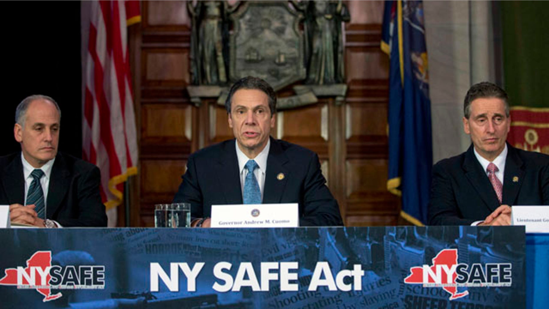 Jan. 14, 2013: New York Gov. Andrew Cuomo, center, speaks during a news conference announcing an agreement with legislative leaders on New York's Secure Ammunition and Firearms Enforcement Act in the Red Room at the Capitol.