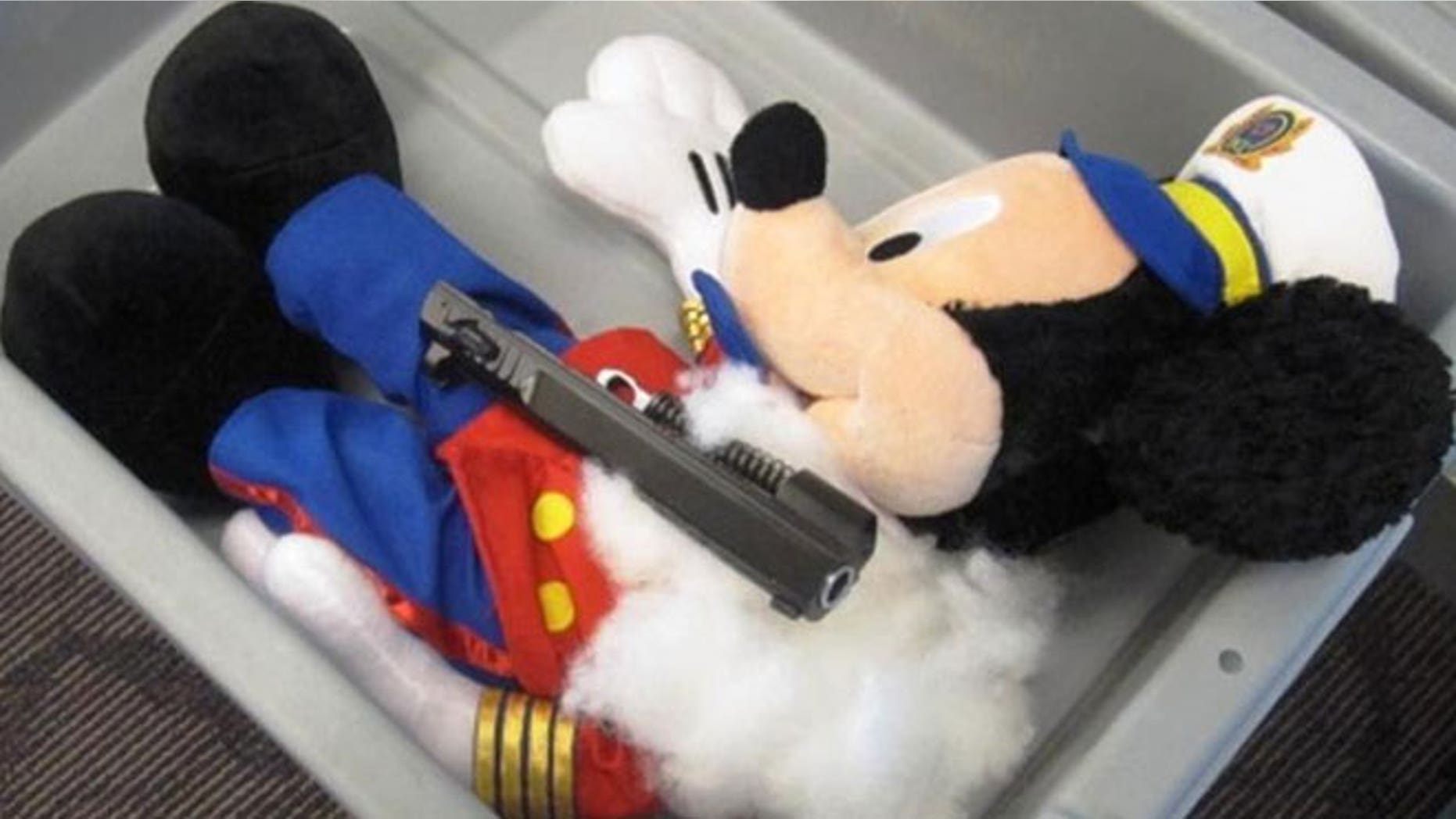 This undated photo provided by the federal Transportation Security Administration shows pistol parts hidden in a stuffed animal found by TSA officials at T.F. Green Airport in Warwick, R.I., Monday May 7, 2012.