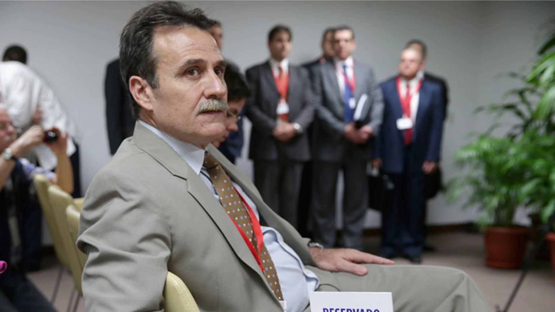 Cuban Foreign Ministry Deputy Director of the Directorate General of United States Gustavo Machín Gómez joins other members of the Cuban delegation during a news conference after migration talks between the U.S. and Cuba at the Palacio de las Convenciones de La Habana January 21, 2015 in Havana, Cuba. (Photo by Chip Somodevilla/Getty Images)