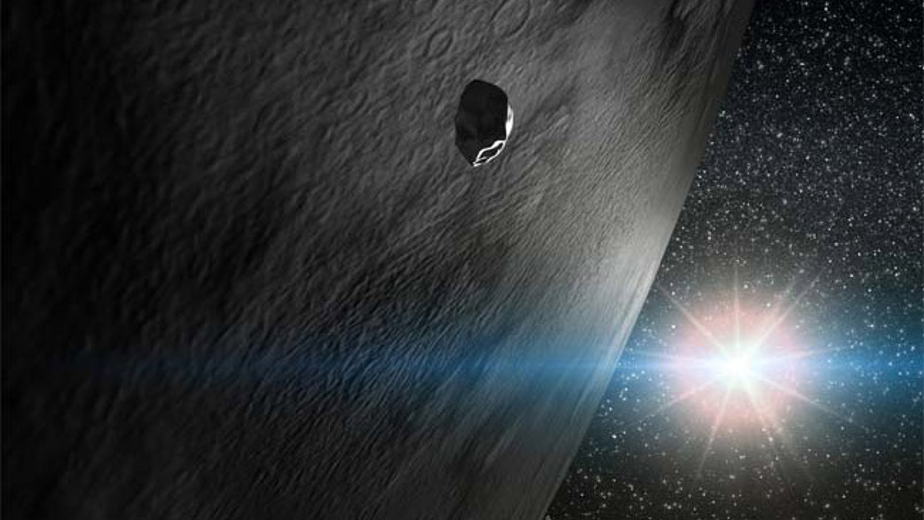 An illustration of the asteroid 24 Themis along with two small fragments that orbit with it. One of the small fragments is inert (as most asteroids are) and the other has a comet-like tail.