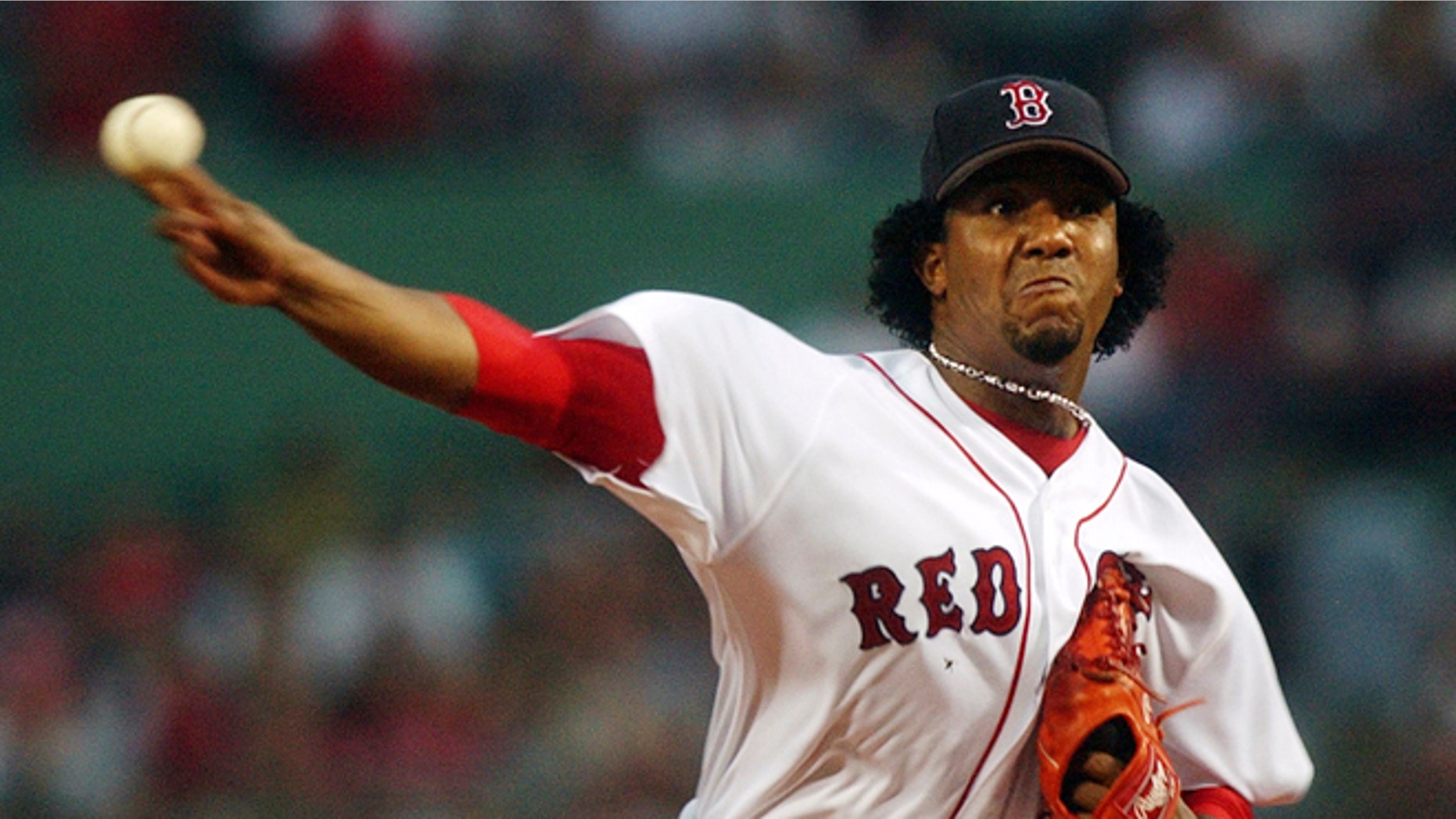 FILE - In this June 25, 2004 file photo, Boston Red Sox starting pitcher Pedro Martinez delivers during the first inning of a Major League baseball game against the Philadelphia Phillies at Fenway Park in Boston. Martinez is among among 17 first-time candidates on the 2015 Baseball Hall of Fame ballot. (AP Photo/Charles Krupa, File)