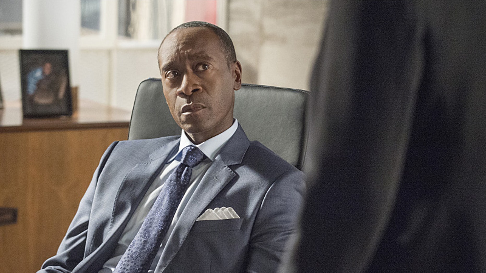 Don Cheadle as Marty Kaan in House of Lies