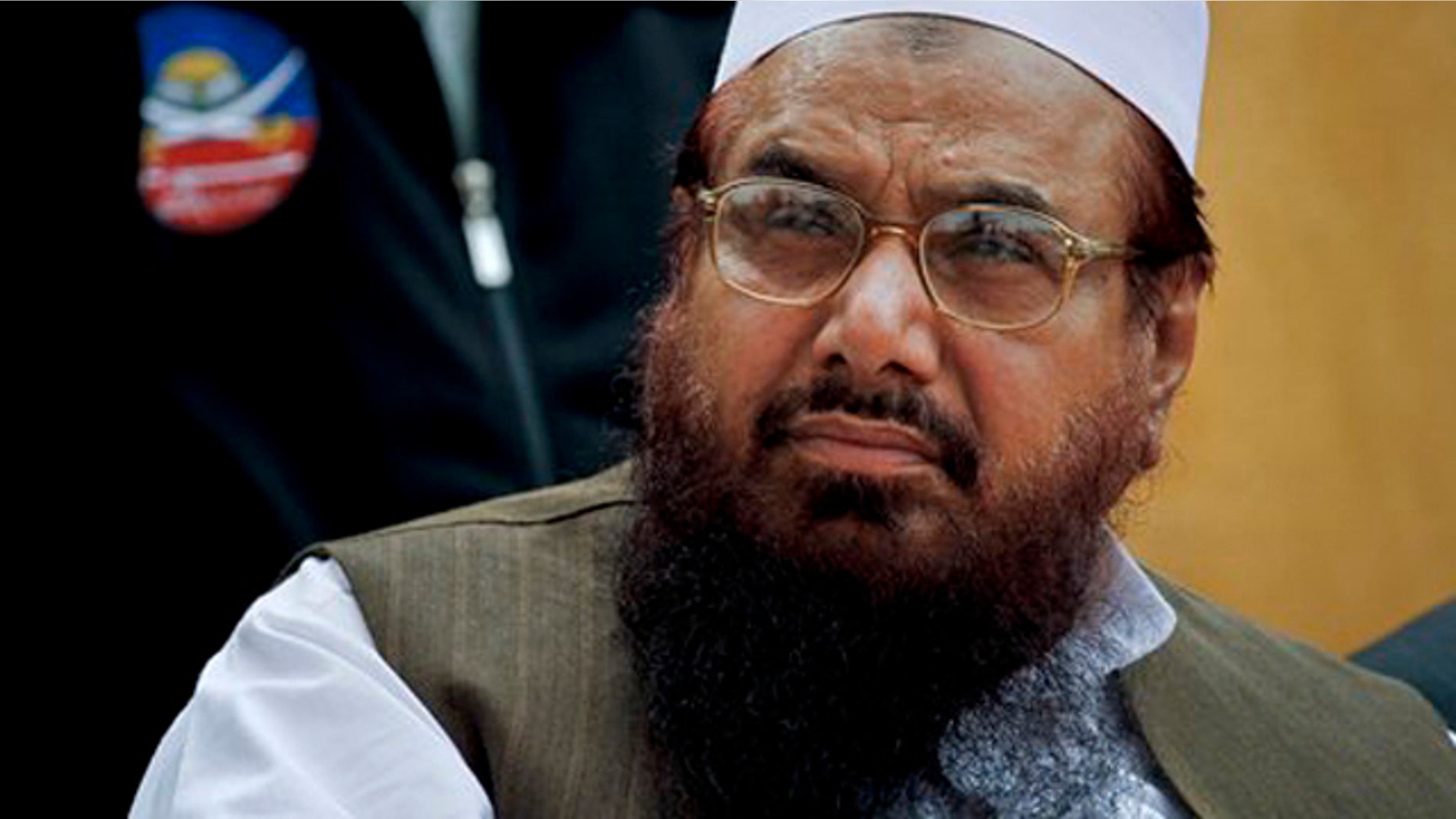 FILE - Lashkar-e-Taiba founder Hafiz Saeed, attends a ceremony in Islamabad, Pakistan.