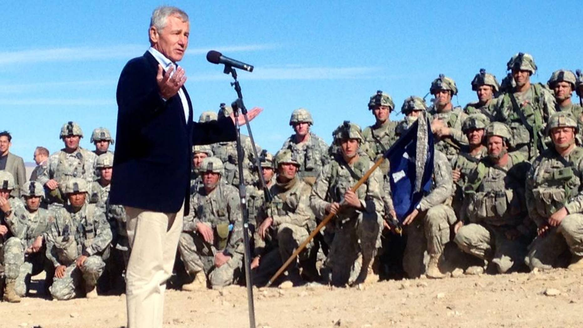 U.S. Secretary of Defense Chuck Hagel speaks to members of 3rd Brigade, 4th Infantry Division, at the National Training Center in Fort Irwin, Calif. on Sunday, Nov. 16, 2014. Wary of a more muscular Russia and China, Hagel said Saturday the Pentagon will make a new push for fresh thinking about how the U.S. can keep and extend its military superiority despite tighter budgets and the wear and tear of 13 years of war. (AP Photo/Robert Burns)