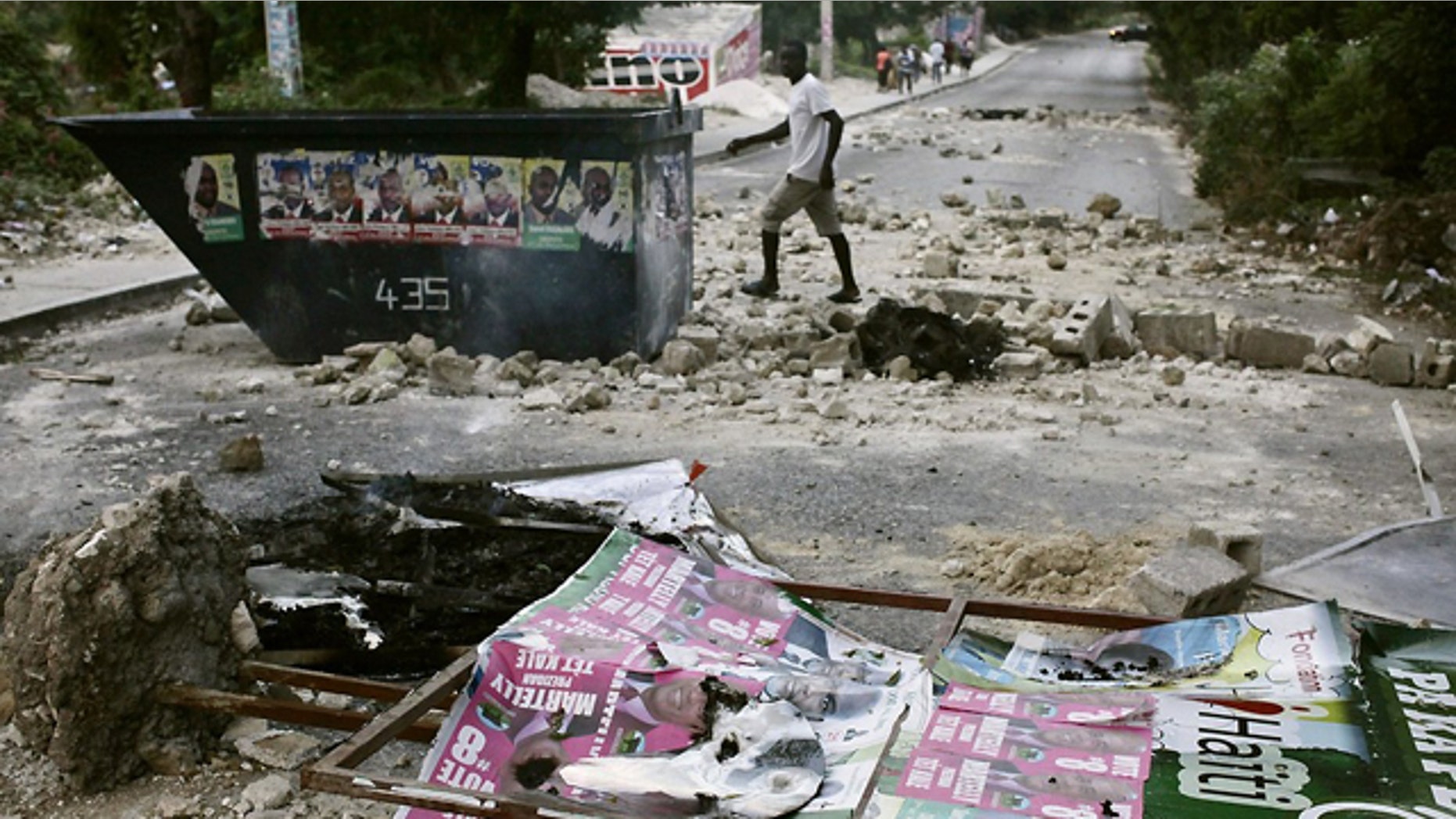 Protests and sporadic gunfire have erupted in Haiti's capital.