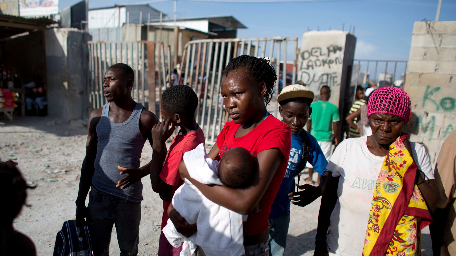 Haitian migrants just deported from Dominican Republic, at the border crossing in Malpasse, June 17, 2015.