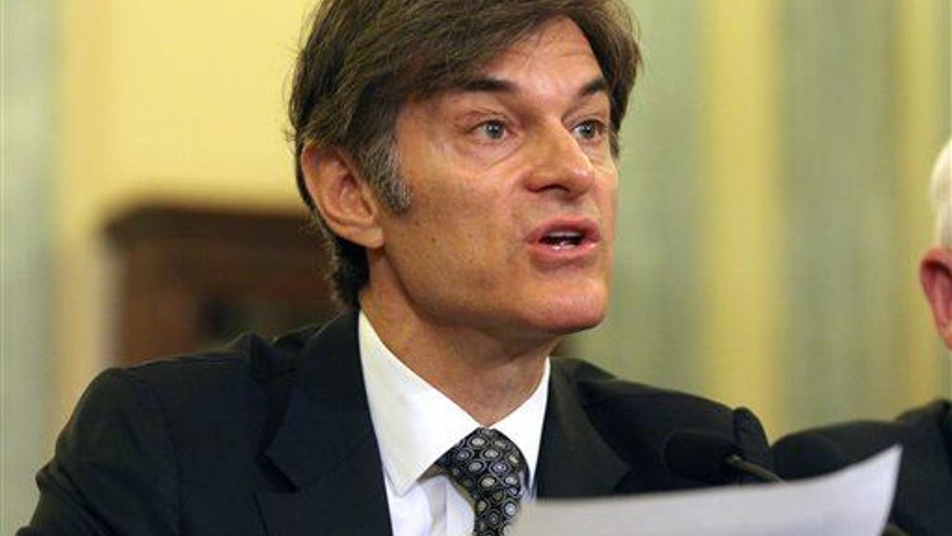 Dr. Mehmet C. Oz, chairman and professor of surgery, Columbia University College of Physicians and Surgeons, testifies on Capitol Hill on June 17, 2014, before a Senate subcommittee.