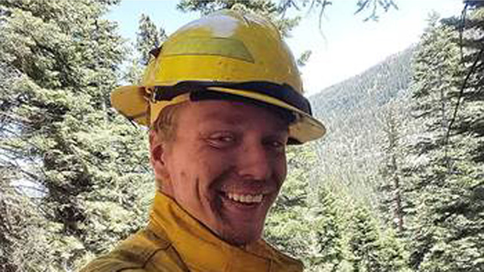 This undated photo released by the U.S. Forest Service shows firefighter Michael Hallenbeck. Hallenbeck died Aug. 8, 2015 when he was struck by a tree while fighting a wildfire in northern California. (U.S. Forest Service)