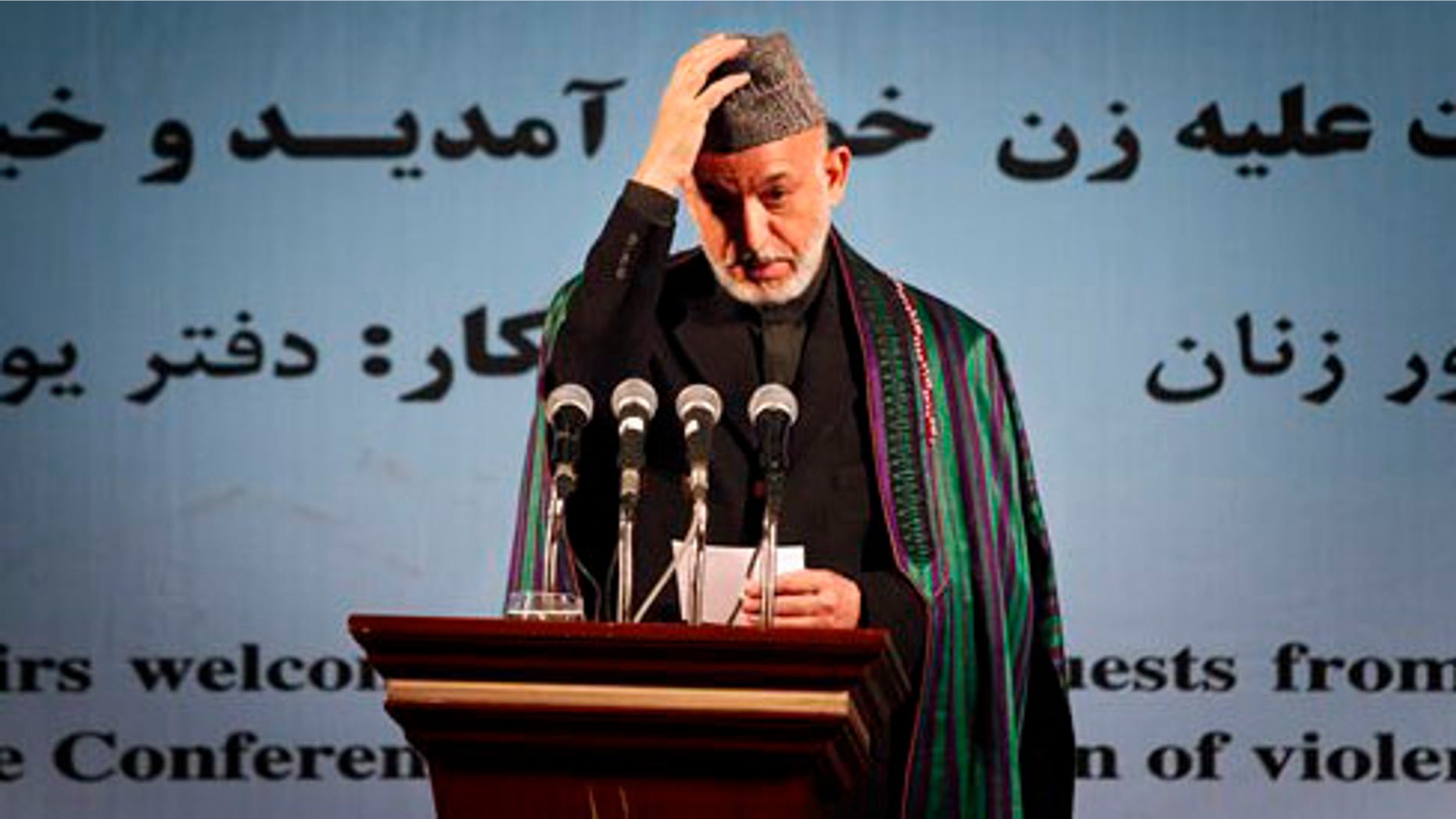 Afghan President Hamid Karzai, during a women's right ceremony in Kabul, Afghanistan on Wednesday, Nov. 24, 2010. President Hamid Karzai said he was happy the results from the Sept. 18 elections were being announced, and called on losing candidates not to take their complaints to the streets but instead to those empowered to deal with them. (AP Photo/Musadeq Sadeq)