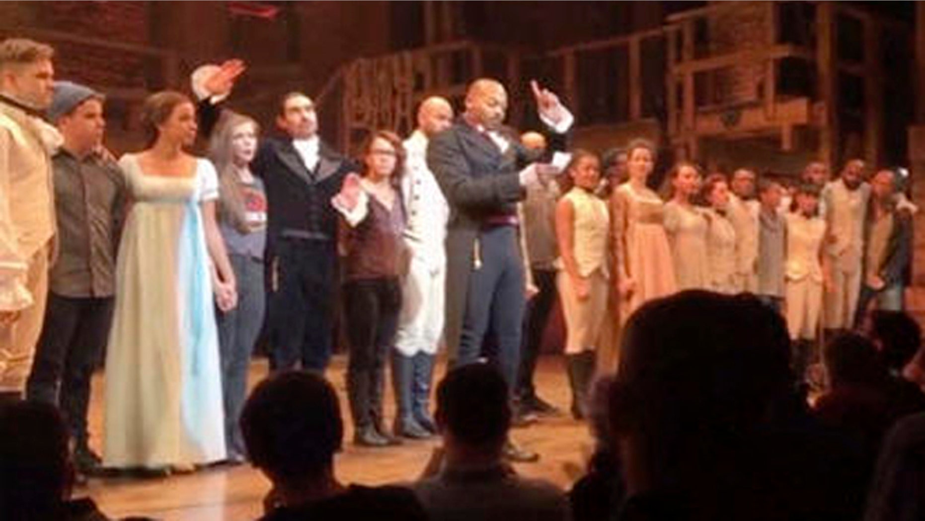 In this image made from a video provided by Hamilton LLC, actor Brandon Victor Dixon who plays Aaron Burr, the nations third vice president, in "Hamilton" speaks from the stage after the curtain call in New York, Friday, Nov. 18, 2016. Vice President-elect Mike Pence is the latest celebrity to attend the Broadway hit "Hamilton," but the first to get a sharp message from a cast member from the stage. (Hamilton LLC via AP)