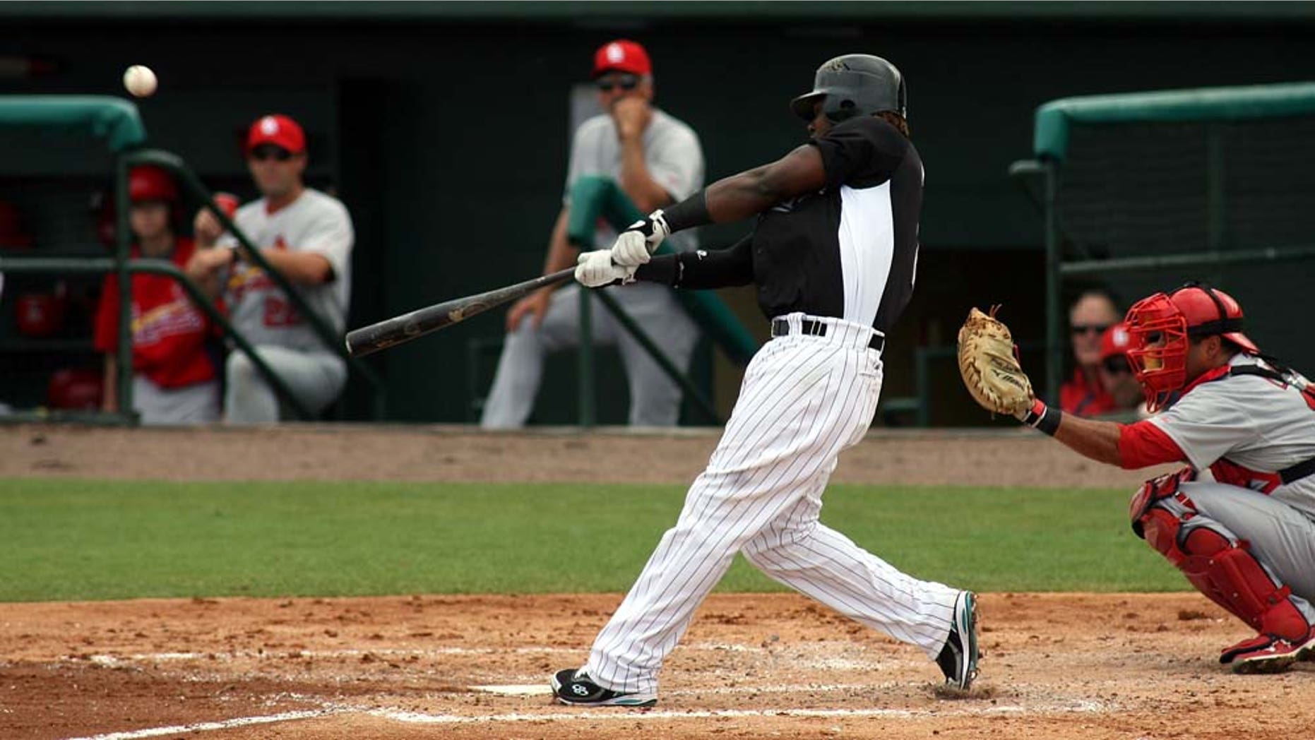 JUPITER, FL - MARCH 06: Hanley Ramirez #2 of the Florida Marlins bats against the St. Louis Cardinals at Roger Dean Stadium on March 6, 2011 in Jupiter, Florida. (Photo by Marc Serota/Getty Images)