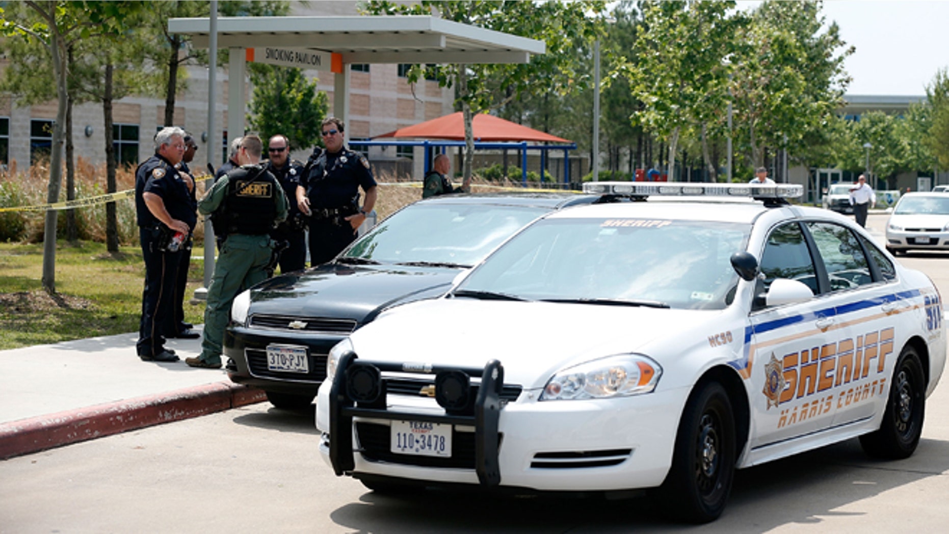 CYPRESS, TX - APRIL 09: Harris County Sheriff officers seal off the campus after at least 14 people were injured in a stabbing incident at the Cy-Fair campus of Lone Star College on April 9, 2013 in Cypress, Texas. The community college located in northwest Houston was on lockdown until police detained a 21-year-old male student believed to be a suspect. (Photo by Scott Halleran/Getty Images)