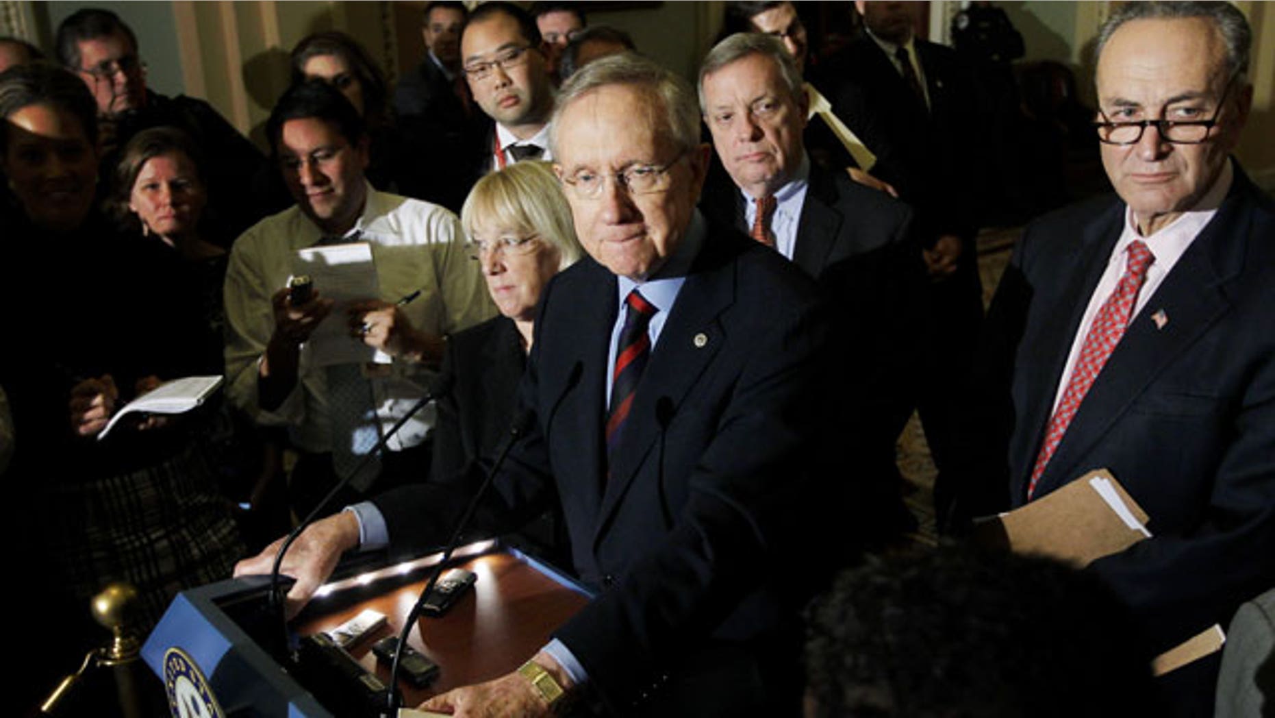 December 1, 2011: Senate Majority Leader Harry Reid of Nev., center, accompanied by Sen. Patty Murray, D-Wash., Senate Majority Whip Richard Durbin of Ill., and Sen. Charles Schumer, D-N.Y., speaks to reporters about extending the payroll tax cut on Capitol Hill in Washington.