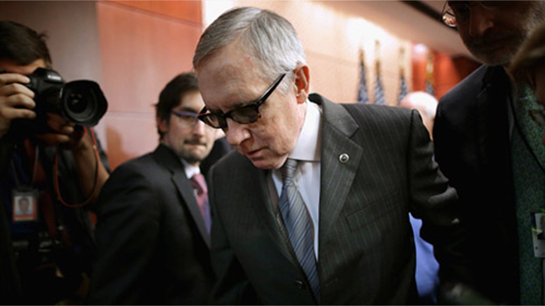 WASHINGTON, DC - FEBRUARY 24: Senate Minority Leader Harry Reid (D-NV) leaves a news conference where he accused Republican Senate leaders of manufacturing the possible shutdown of the Department of Homeland Security at the U.S. Capitol February 24, 2015 in Washington, DC. Democrats have successfully blocked the $39.7 billion funding legislation because it would also strip away the executive actions in which President Barack Obama eased the deportation threat for several million undocumented immigrants. If Republicans and Democrats can not work around the impasse then 30,000 DHS employees will go home February 28 and 200,000 more will work without paychecks until a solution is found. (Photo by Chip Somodevilla/Getty Images)