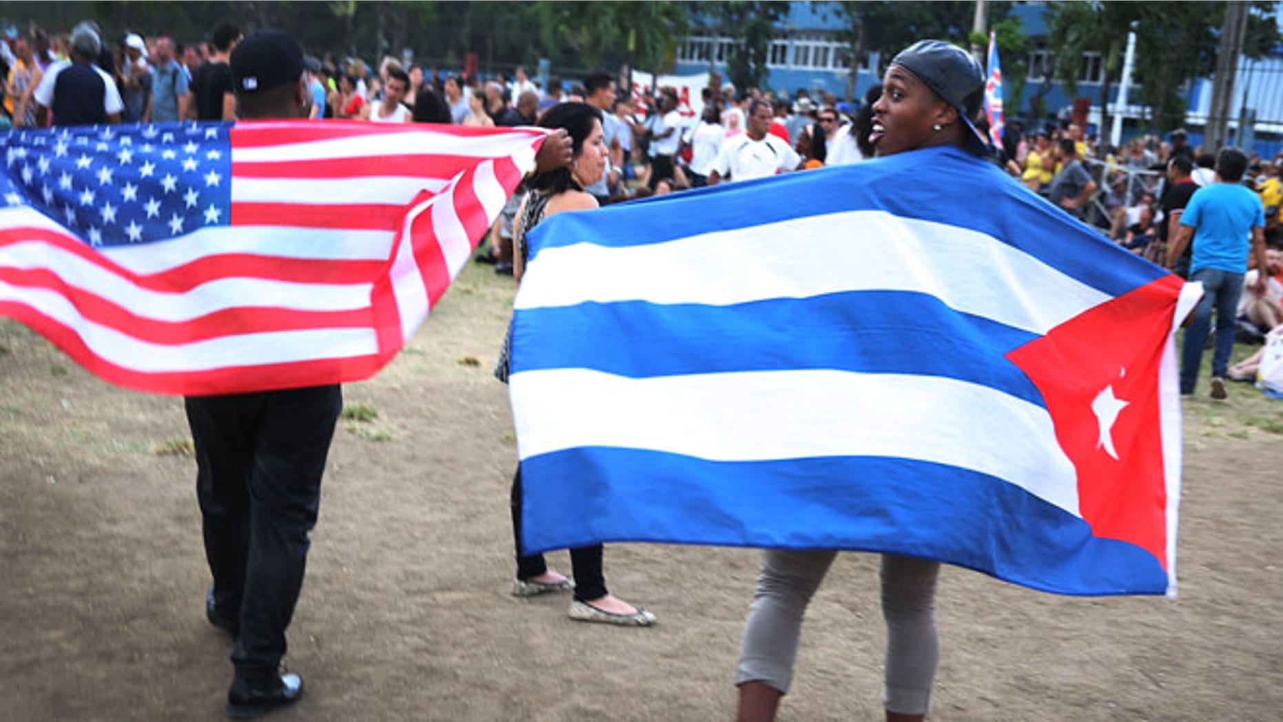 HAVANA, CUBA - MARCH 25: Rolling Stones fans wait for the start of a free concert March 26, 2016 in Havana, Cuba. Thousands of fans waited for the Rolling Stones to play for the first time in Cuba, after the music was once banned by the government. (Photo by Joe Raedle/Getty Images)