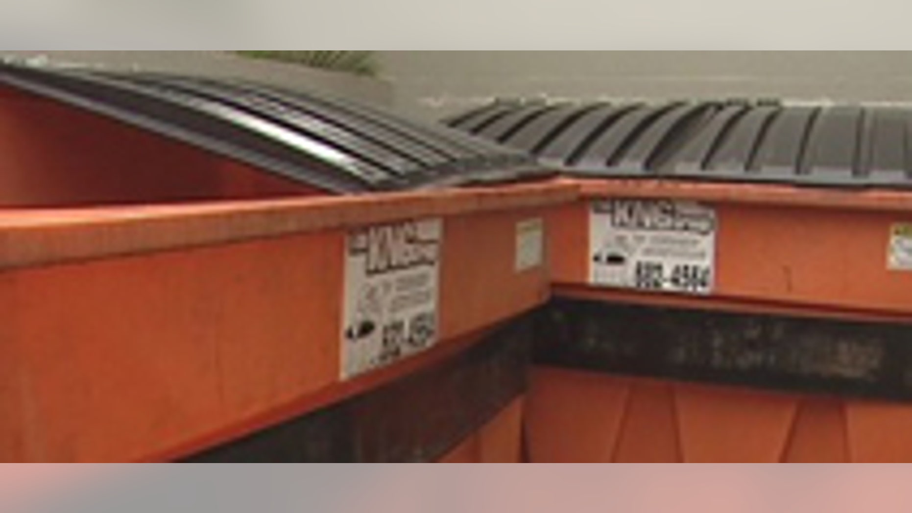 Mar. 12, 2012: Police search for clues after a child's fingers were found in this dumpster in Hawaii.