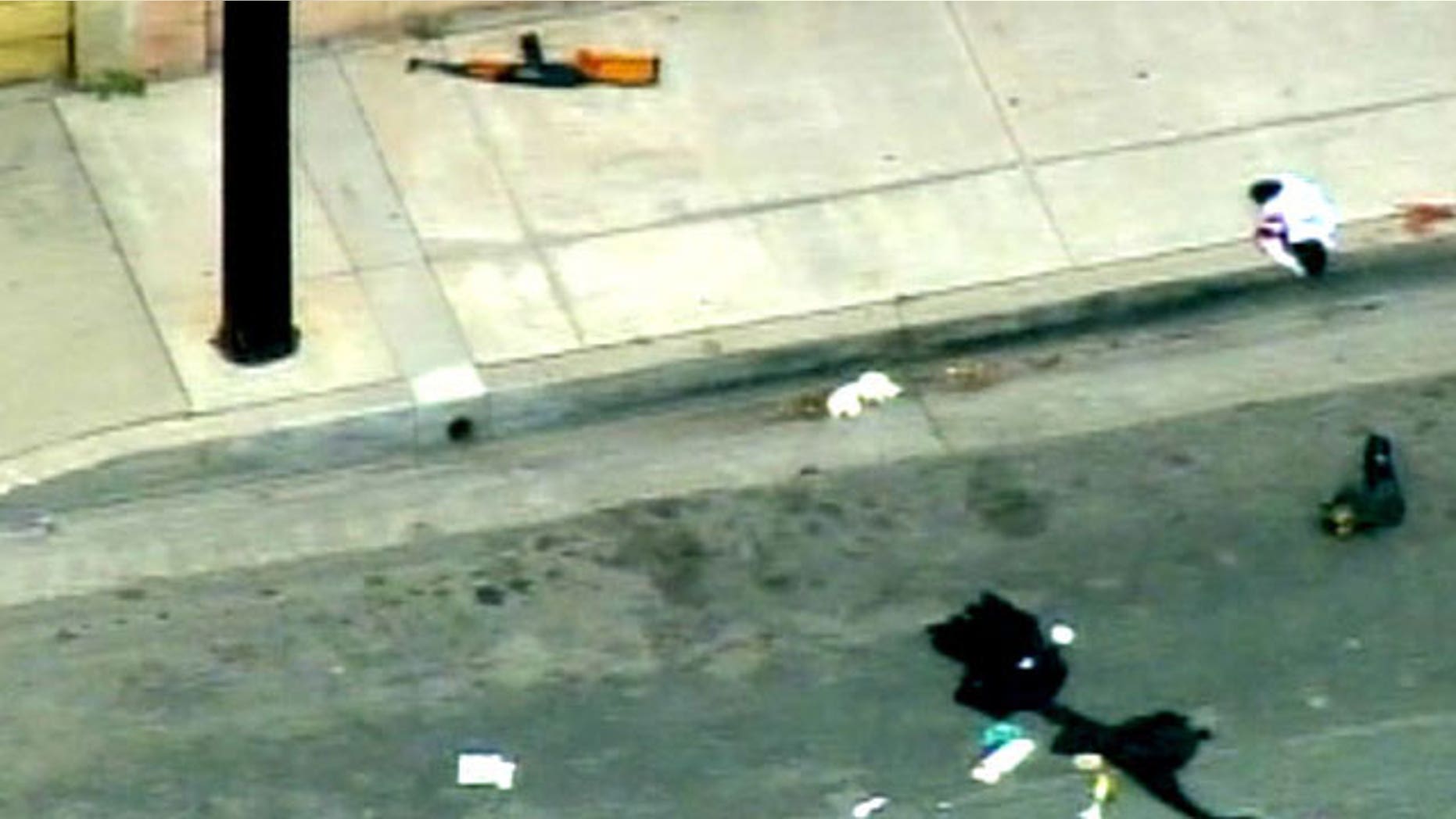 May 6: Investigators say a gunman with an assault rifle and a can of gasoline stormed his ex-girlfriend's Hawaiian Gardens home. (MyFoxLA.com)
