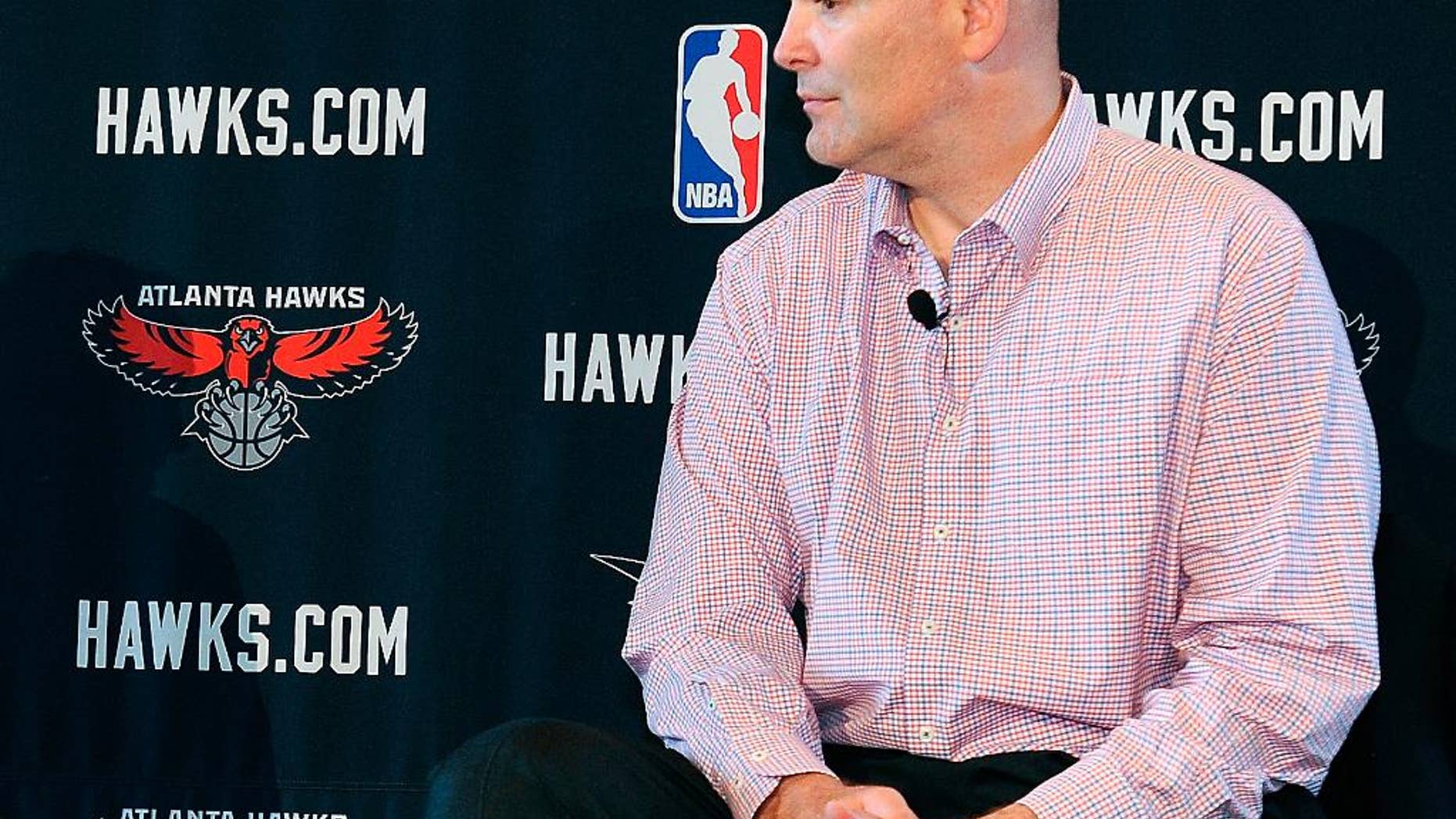 FILE - In this May 29, 2013, file photo, Atlanta Hawks general managerr Danny Ferry waits during a news conference in Atlanta. Ferry has taken an indefinite leave of absence after making racially charged comments about a potential free agent. (AP Photo/David Tulis, File)