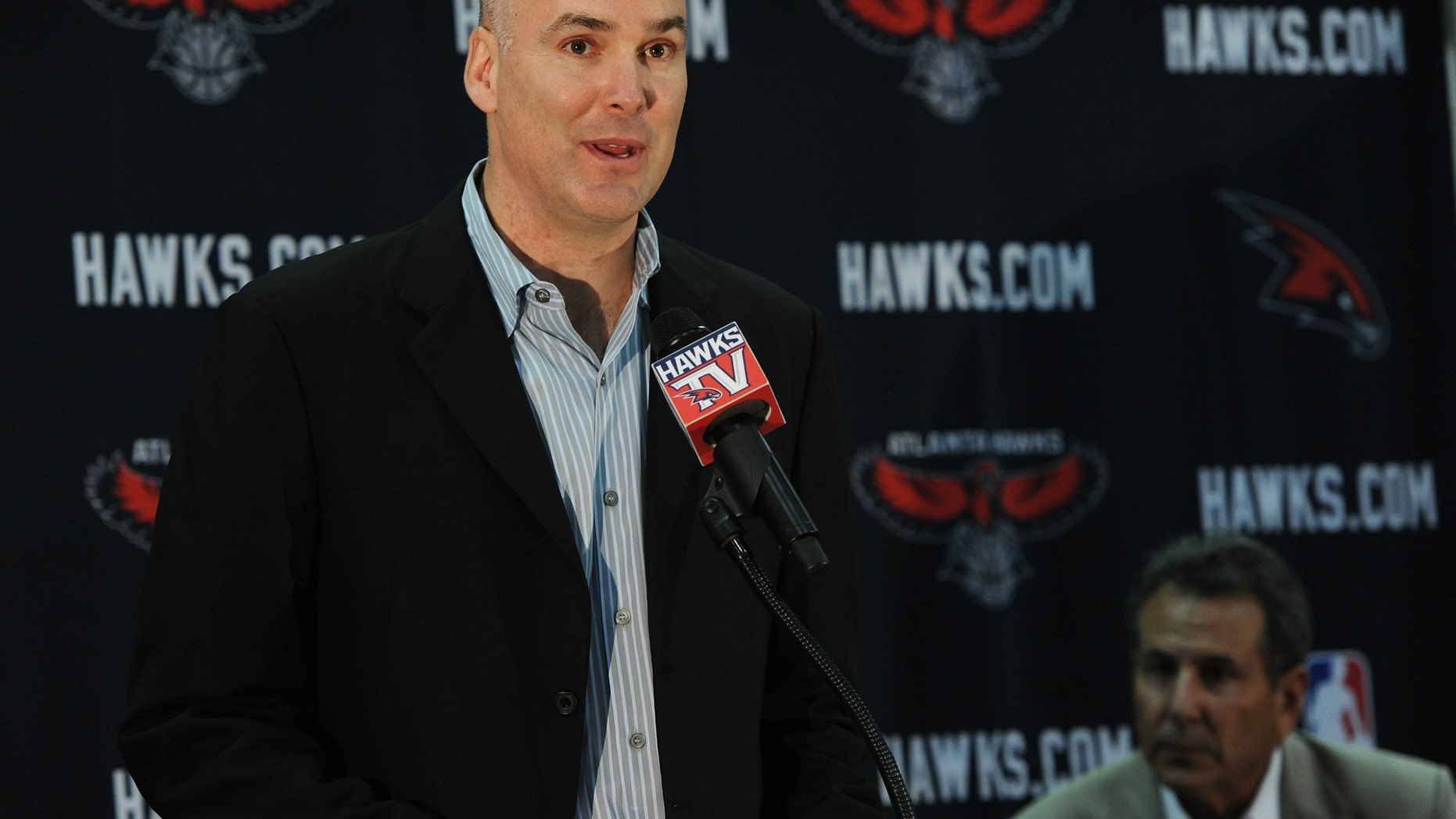 June 25, 2012: Atlanta Hawks president of operations and general manager Danny Ferry speaks during a news conference in Atlanta, as team co-owner Bruce Levenson, right, looks on. (AP/The Atlanta Journal-Constitution, Johnny Crawford)