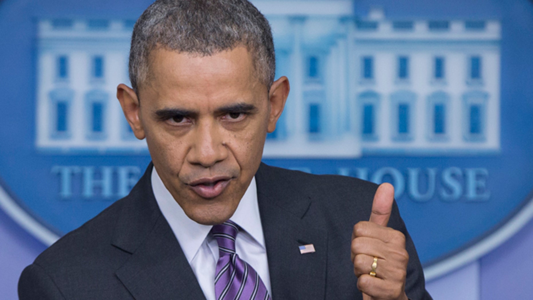 FILE - In this April 17, 2014, file photo, President Barack Obama gestures as he speaks in the White House briefing room in Washington. Blue or red, a majority of states have exceeded their health care sign-up targets under Obama's law, something that would have been hard to imagine after last fall's botched rollout of insurance markets. But the administration's final numbers, released Thursday, May 1, also expose shortcomings, including subpar enrollment among Hispanics, the nation's largest minority group and also its least insured. (AP Photo/Carolyn Kaster, File)