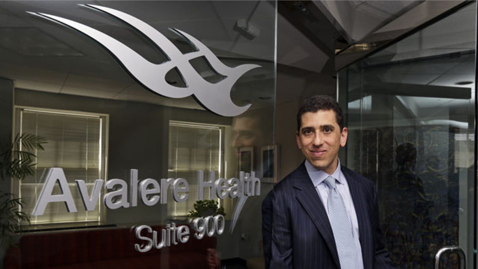 FILE - This May 3, 2013, file photo shows Daniel N. Mendelson, CEO of data analysis firm Avalere Health, which caters to the healthcare industry and government at their Washington office. (AP Photo)