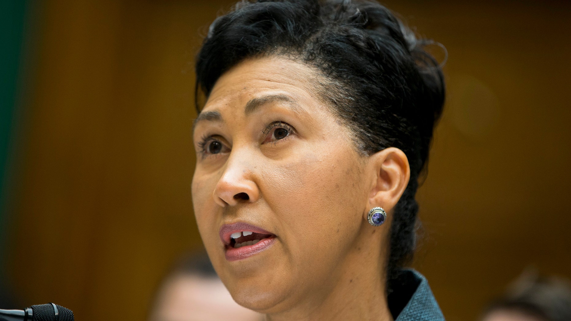 Oct. 24, 2013: Cheryl Campbell, senior vice president of CGI Federal, testifies on Capitol Hill in Washington.