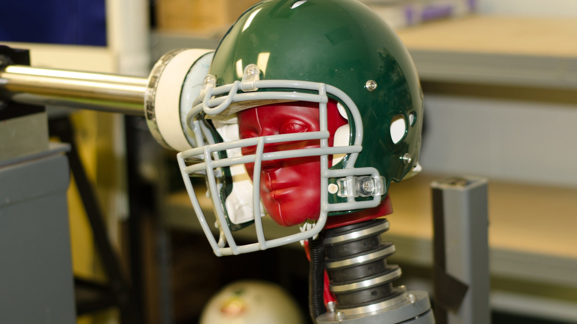 This handout photo provided by the Southern Impact Research Center in Tennessee, taken June 18, shows equipment that can test how football helmets perform against certain concussion-causing forces.