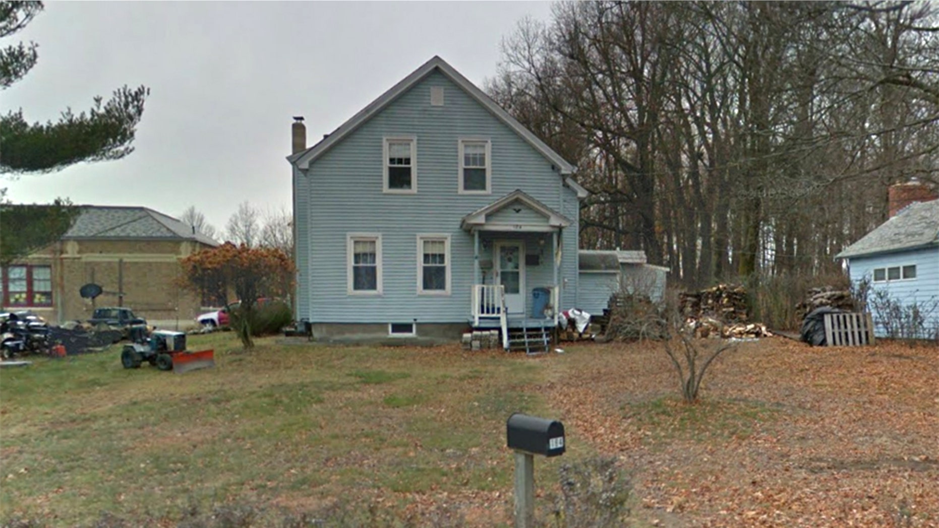 A woman died after falling into a fire pit at this home in Worcester, Massachusetts, fire officials said.