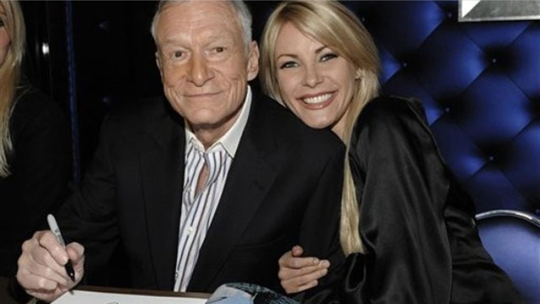 Dec. 10: Hugh Hefner, left, and model Crystal Harris at a party celebrating the release of the book "Hugh Hefner's Playboy" a limited edition anthology by Taschen in Beverly Hills, Calif.