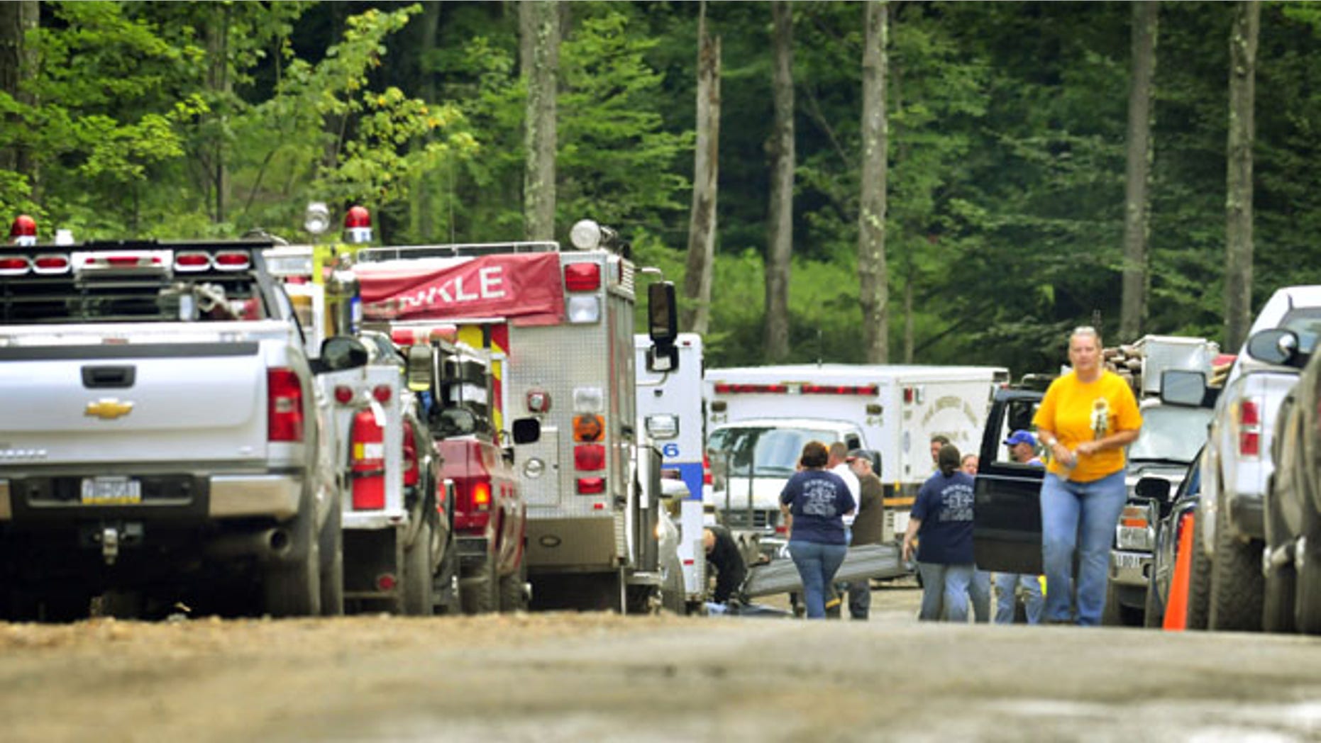 July 28, 2013: A helicopter crash in a remote, wooded area of northeastern Pennsylvania claimed the lives of five people, state police said Sunday. (AP Photo)