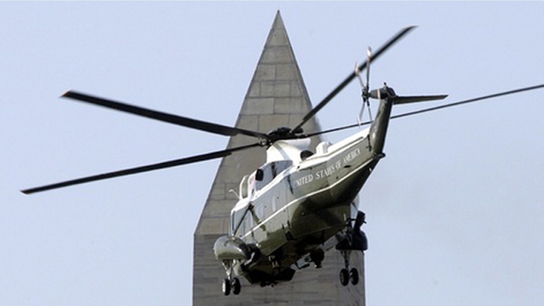 May 1, 2007: The Marine One helicopter carrying passes by the Washington Monument.