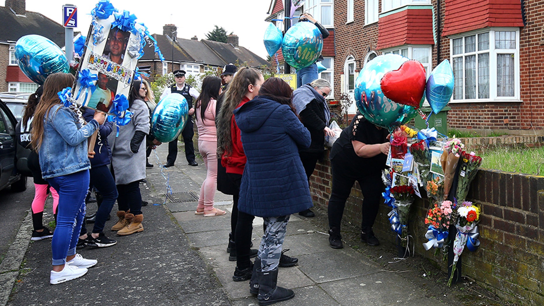 A group of women brought flowers and balloons to the spot in London where Henry Vincent was fatally stabbed in botched burglary at the home of an elderly man, Richard Osborn-Brooks. Vincent would have turned 38 Sunday.