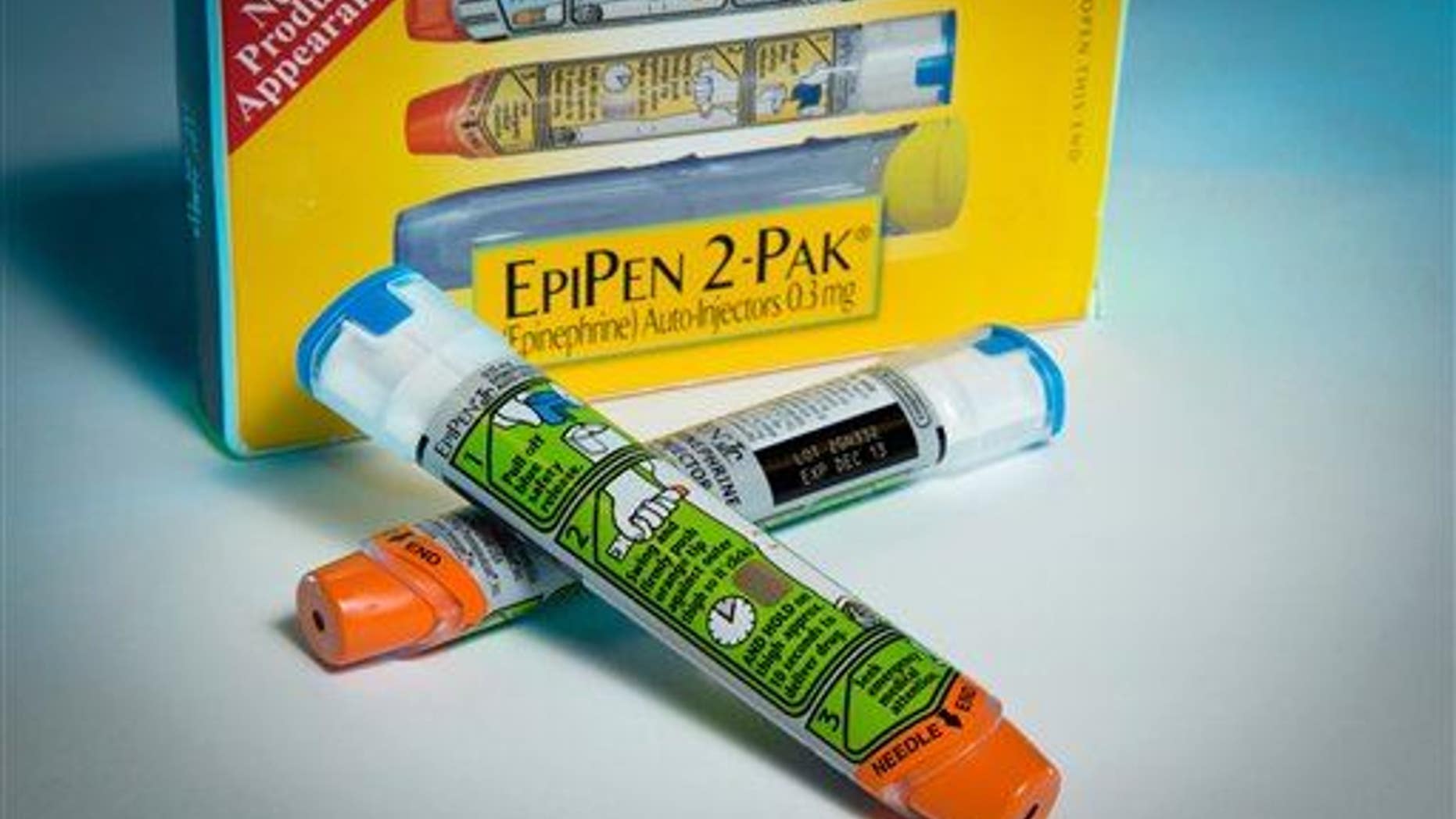Examples of epinephrine pens that the Center for Disease Control and Prevention guidelines recommend that schools stock to combat food allergies are photographed in Washington on Nov. 13, 2013.